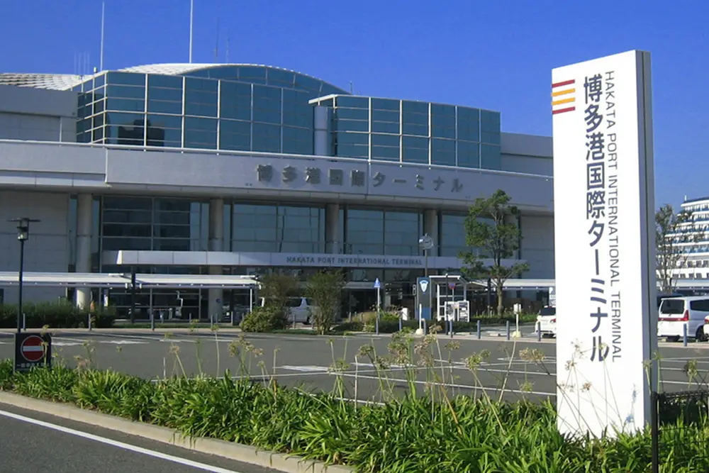 A view of the taxi stand located right in front of the exit of the Hakata Port International Passenger Terminal.